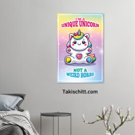 Unique Unicorn poster being displayed on a grey wall above a grey bed and side table with a plant below Unique Unicorn poster being displayed on a grey wall above a grey bed and side table with a plant below